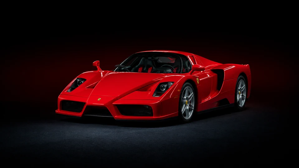 Red Ferrari Enzo viewed from the front three-quarter angle
